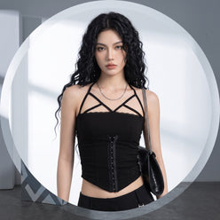 Jordan West wearing a halter cutout crop top against a bright white background, editorial portrait style.