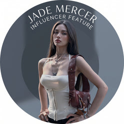 A circular portrait of Jade Mercer wearing a modern halter cutout crop top against a clean charcoal studio background.